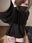 黒パーカースプタンニーソ女子